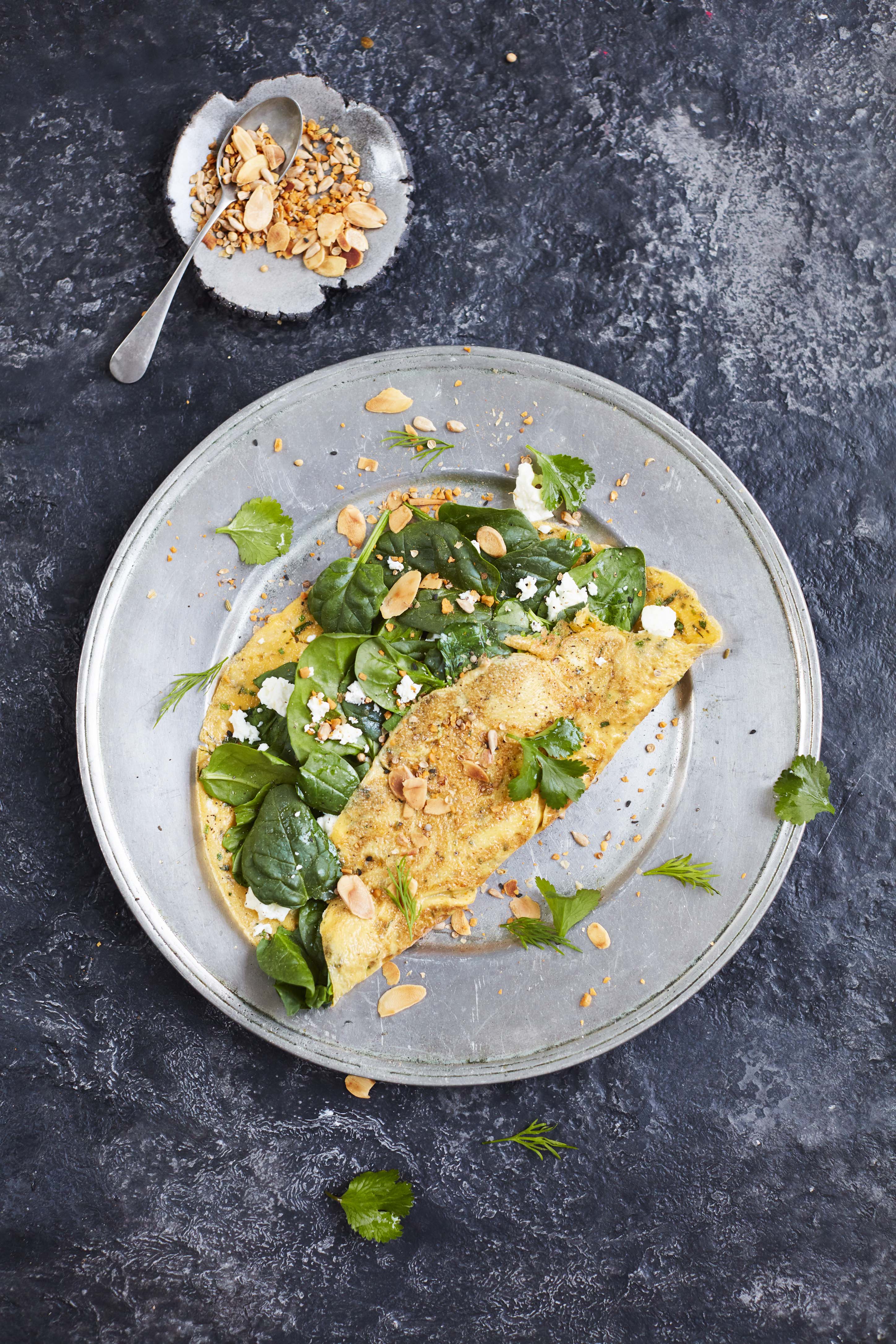 Mixed herb omelette with spinach, feta & dukkah
